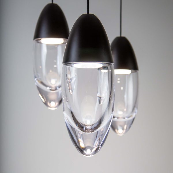 Three bullet-shaped smart pendant lights hanging from the ceiling.
